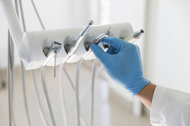Professional Teeth Cleaning And Checkup technician working in Garden City South, NY